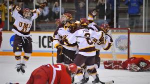 Being mobbed by her teammates after scoring her historic goal against Cornell (Photo by: Brett Groehler)