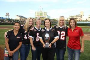 Yvette Holt, Sami Grisafe, Tricia Charbonneau, fan holding the WFA National Championship Trophy, Cubs co-owner Linda Ricketts and Linda Bache (far right) with the WFA National Title(Photo by Ross Forman)