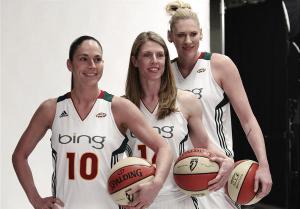 In 2011, Smith joined the defending WNBA champion Seattle Storm. In front of her is Sue Bird, who would win Summer Games gold with Smith as a teammate in 2004 and 2008. Aussie superstar Lauren Jackson hovers behind. Smith would finish with 255 points as the Storm had a 21-13 record (Associated Press Photo)