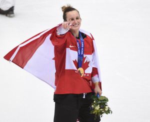 Marie-Philip Poulin is all smiles after scoring the gold-medal winning goal for Canada (Photo credit: Ben Pelosse/Journal de Montreal/QMI Agency OLY2014)