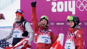 Dara Howell, centre, celebrates after winning gold at Rosa Khutor Extreme Park in Krasnaya Polyana, Russia. Fellow medalists include Devin Logan and Kim Lamarre. (AP / Andy Wong)