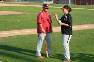 Magalas (right) speaking with a coach during the Canadian National Women's Team tune-up tour for the 2015 Pan Am Games (Photo credit: Mark Staffieri)